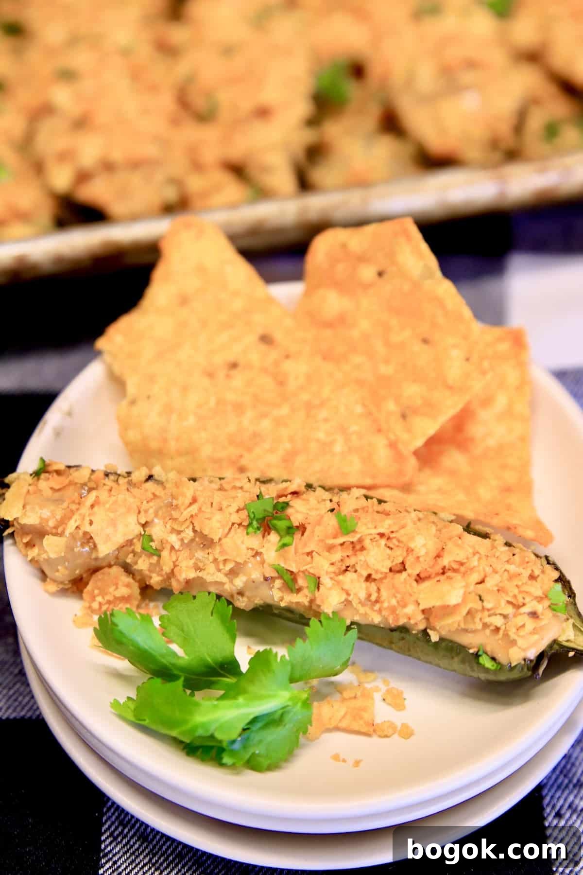 Appetizer plate with Doritos and Nacho Cheese Jalapeno Popper.
