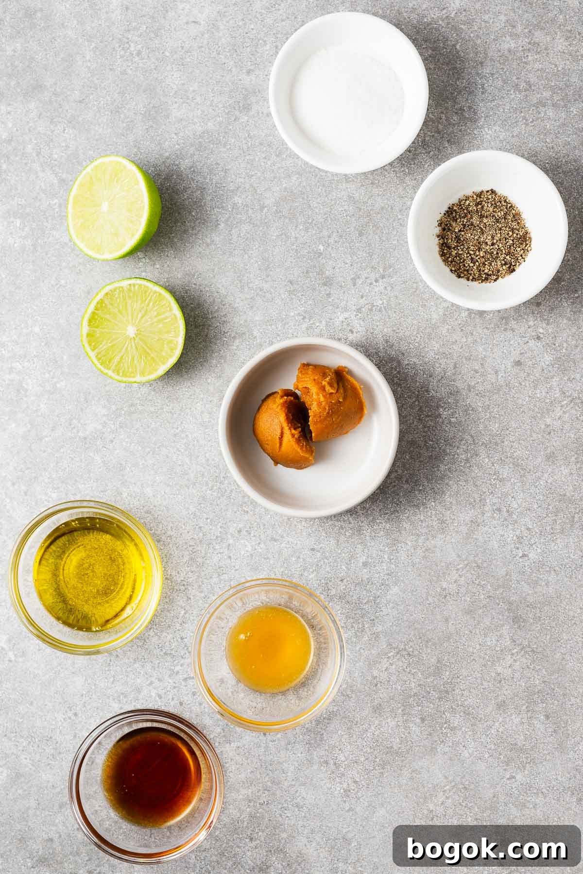 Miso Lime Vinaigrette Recipe — Tangy Asian Dressing 3 The ingredients for miso lime dressing include olive oil, sesame oil, miso paste, lime juice, honey and salt and pepper.