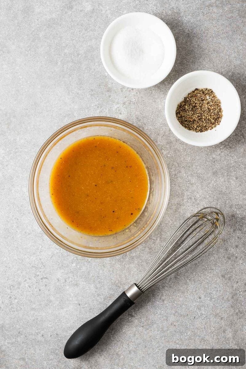 Miso Lime Vinaigrette Recipe — Tangy Asian Dressing 5 The miso lime dressing ingredients whisked in a bowl until well combined and seasoned with salt and black pepper.
