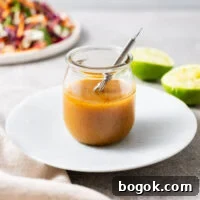 Miso Lime Vinaigrette Recipe — Tangy Asian Dressing 7 Miso lime dressing whisked until emulsified in a glass jar.