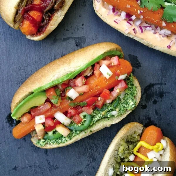 Four carrot hot dogs filled with assorted garnishes.
