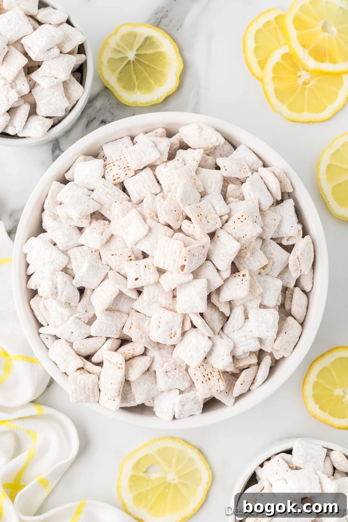 Lemony Puppy Chow Recipe: Zesty No-Bake Snack Mix 2 Lemon puppy chow in a bowl.