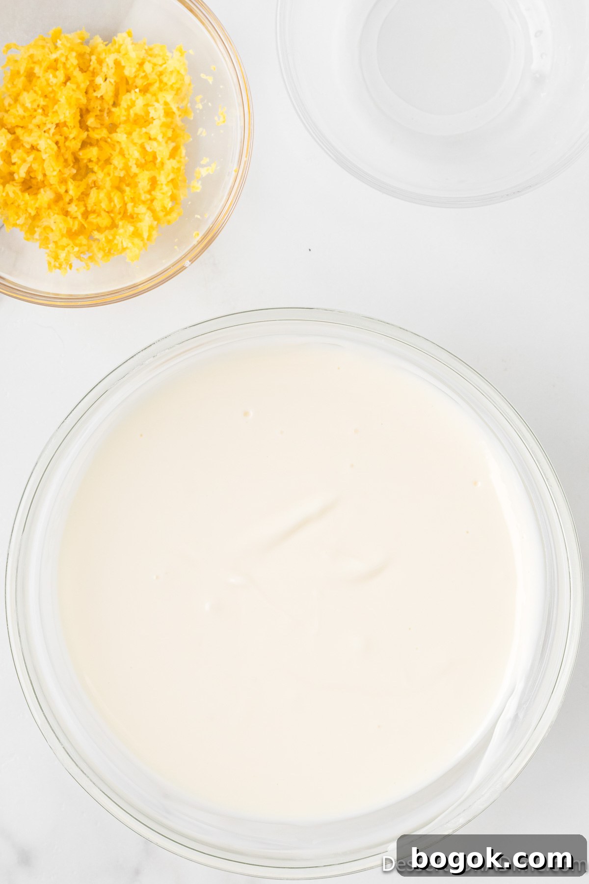 Lemony Puppy Chow Recipe: Zesty No-Bake Snack Mix 4 Melted chocolate in bowl.