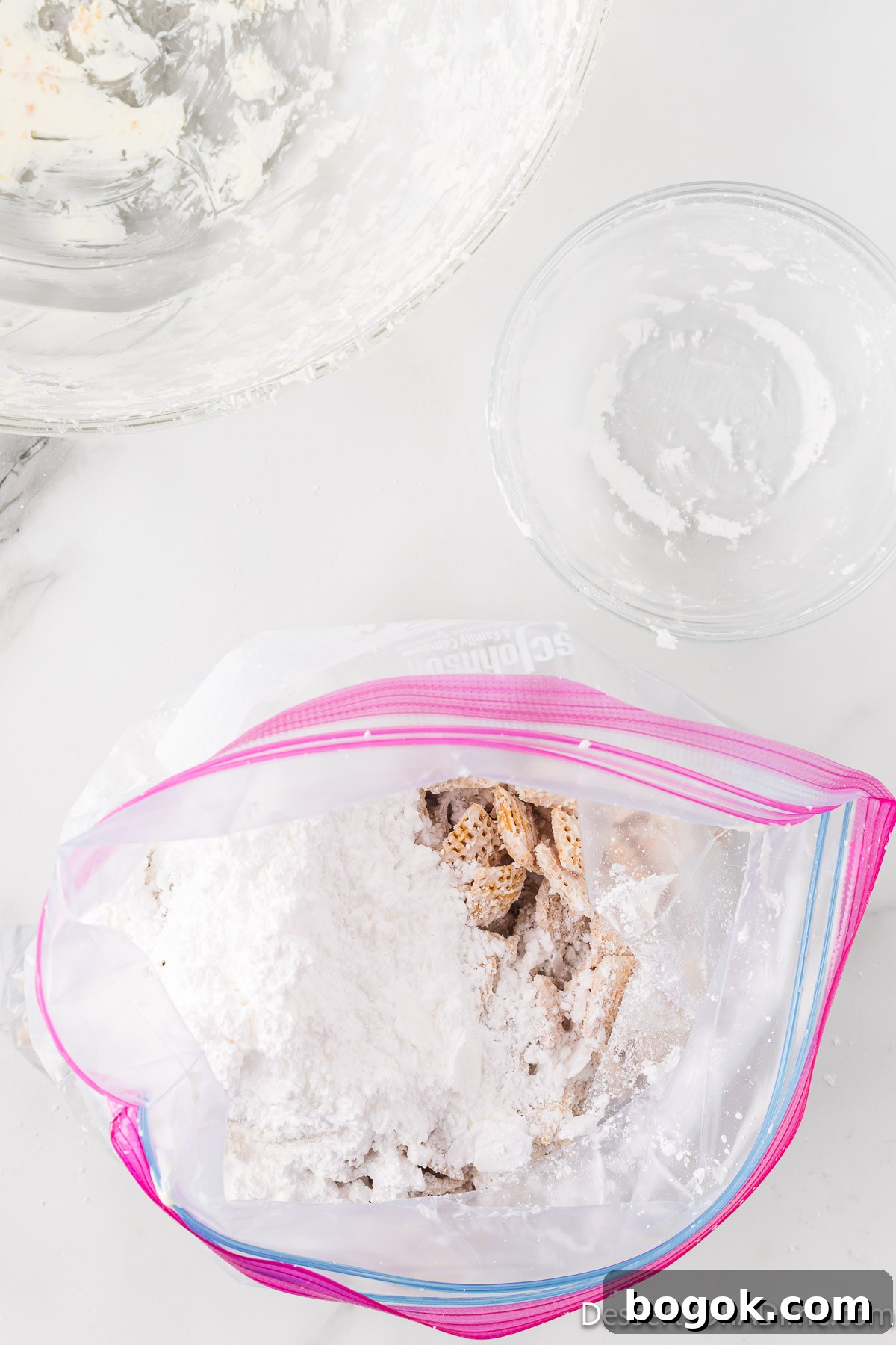 Lemony Puppy Chow Recipe: Zesty No-Bake Snack Mix 8 Ziploc bag with powdered sugar added to cereal mixture.