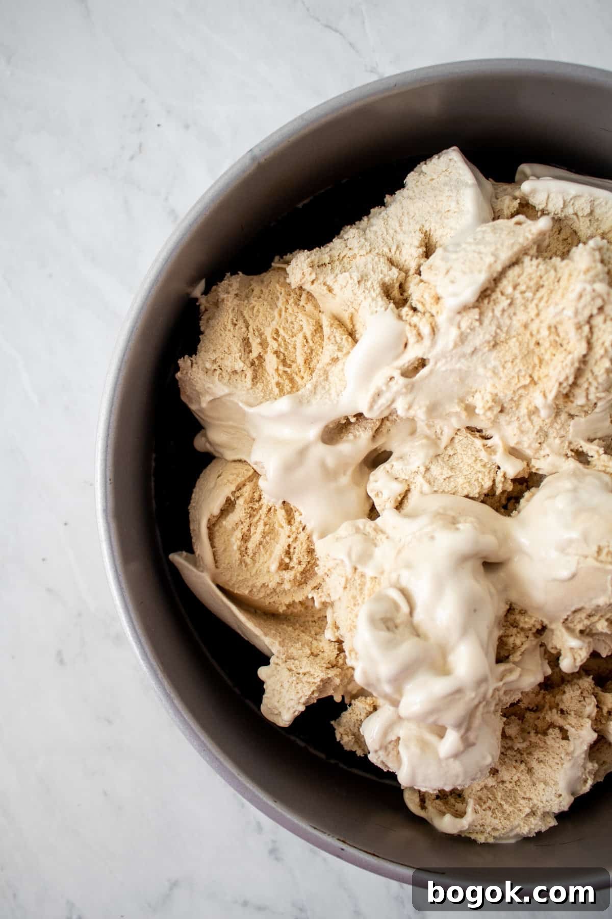 ice cream scoops on top of chocolate crust