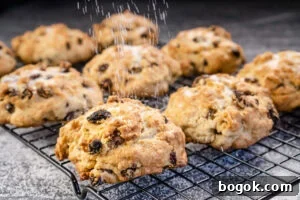 Rock cakes being sprinkled with sugar on top
