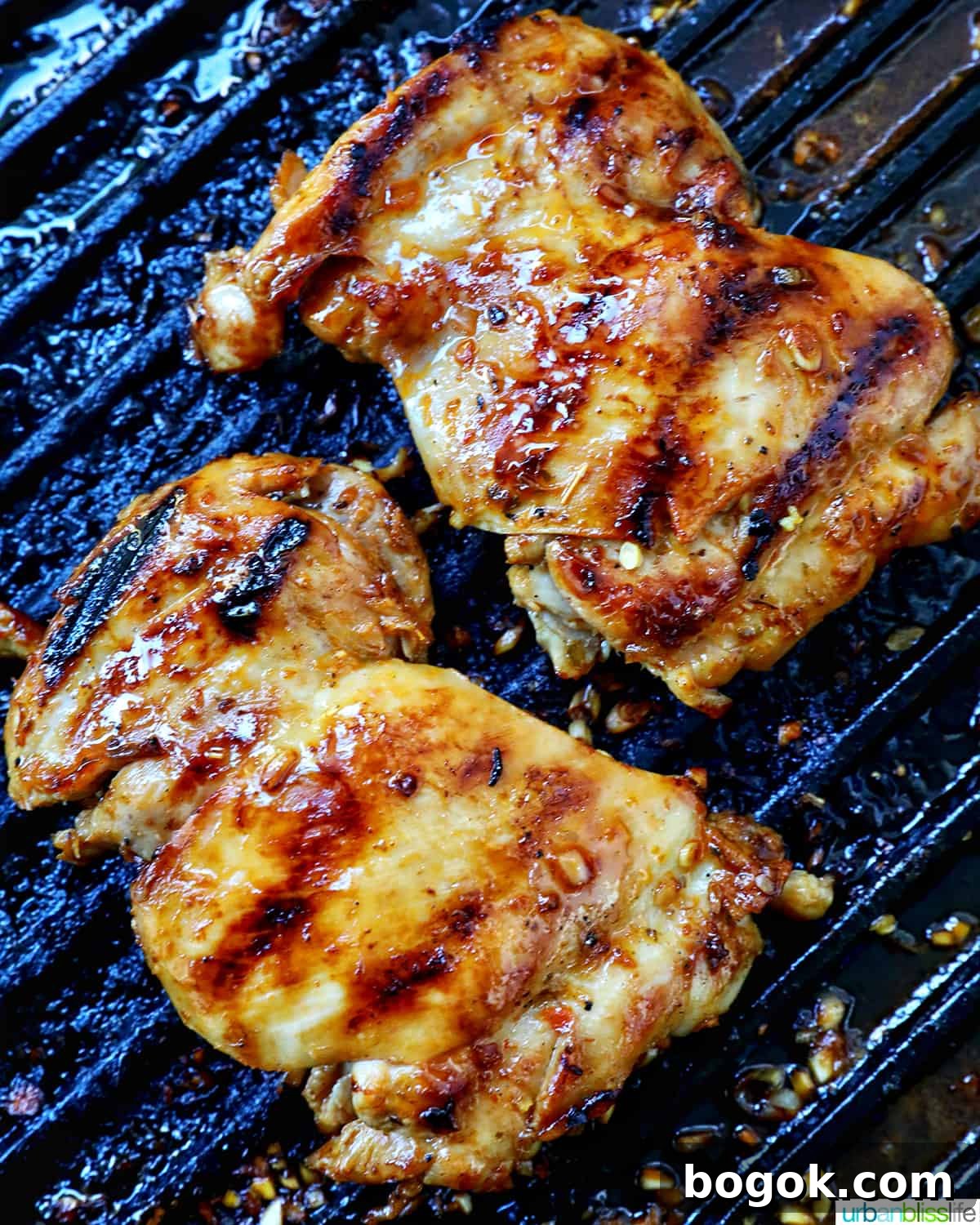 Philippine Chicken Inasal Recipe: Grilled Marinade & Tips 11 chicken grilling on a grill pan.