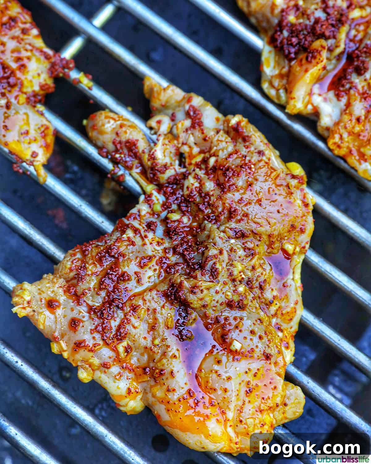 Philippine Chicken Inasal Recipe: Grilled Marinade & Tips 8 marinated chicken inasal on a grill.