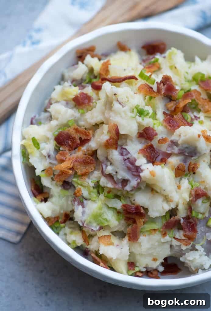 Colcannon potatoes topped with bacon and green onions.