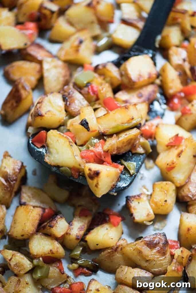 Roasted breakfast potatoes with onions and peppers.
