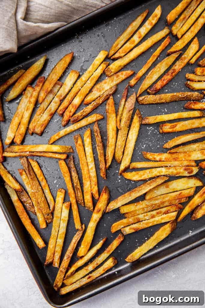 French fries on a baking sheet.