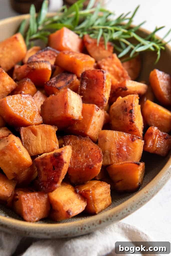 Roasted sweet potato chunks in a serving bowl.