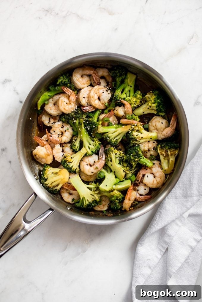 metal skillet with easy shrimp and broccoli recipe