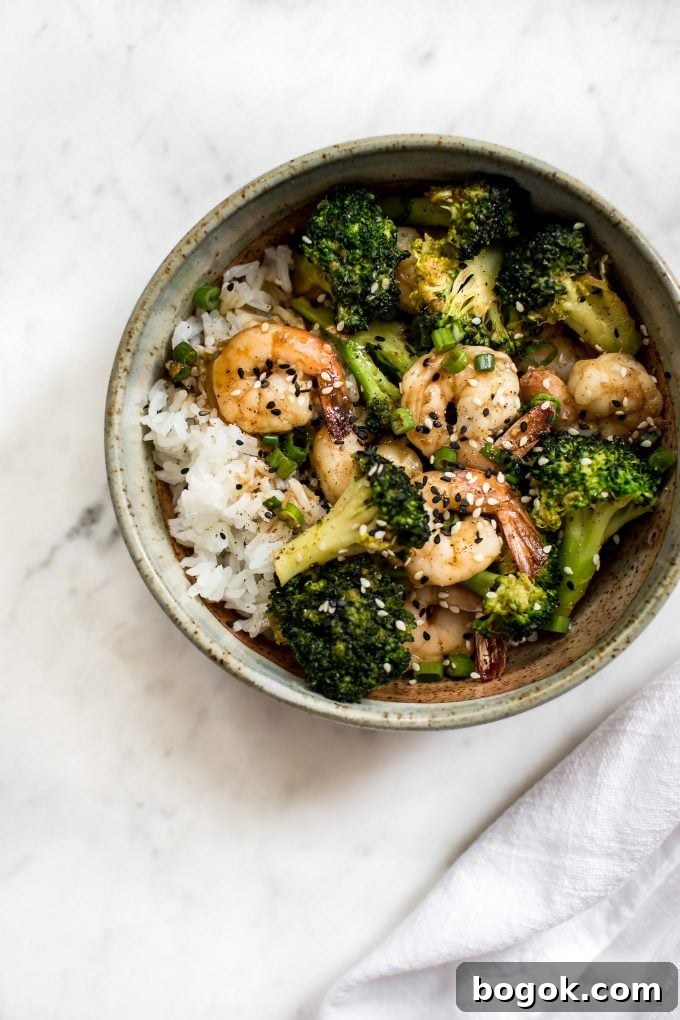 bowl of easy shrimp and broccoli recipe over rice