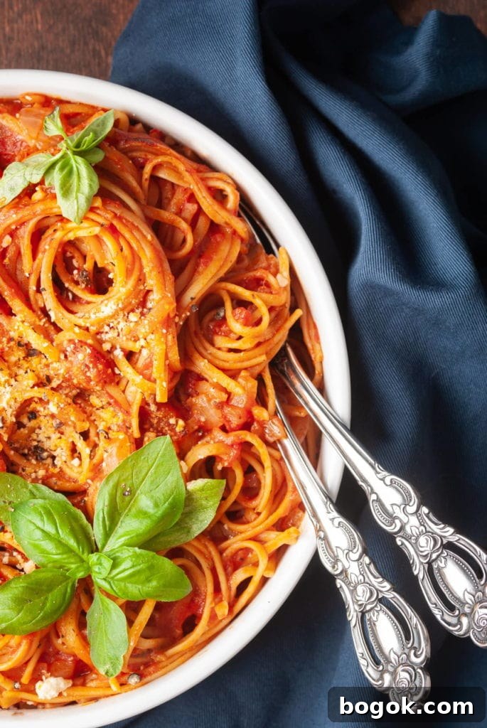 Vegan One-Pot Pasta with Classic Marinara Sauce 2 close up of pasta with tomato sauce and basil