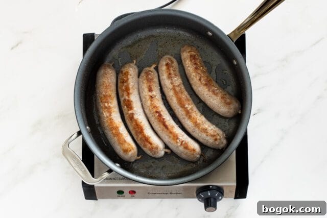 Browning the Italian sausages for the spaghetti dinner.