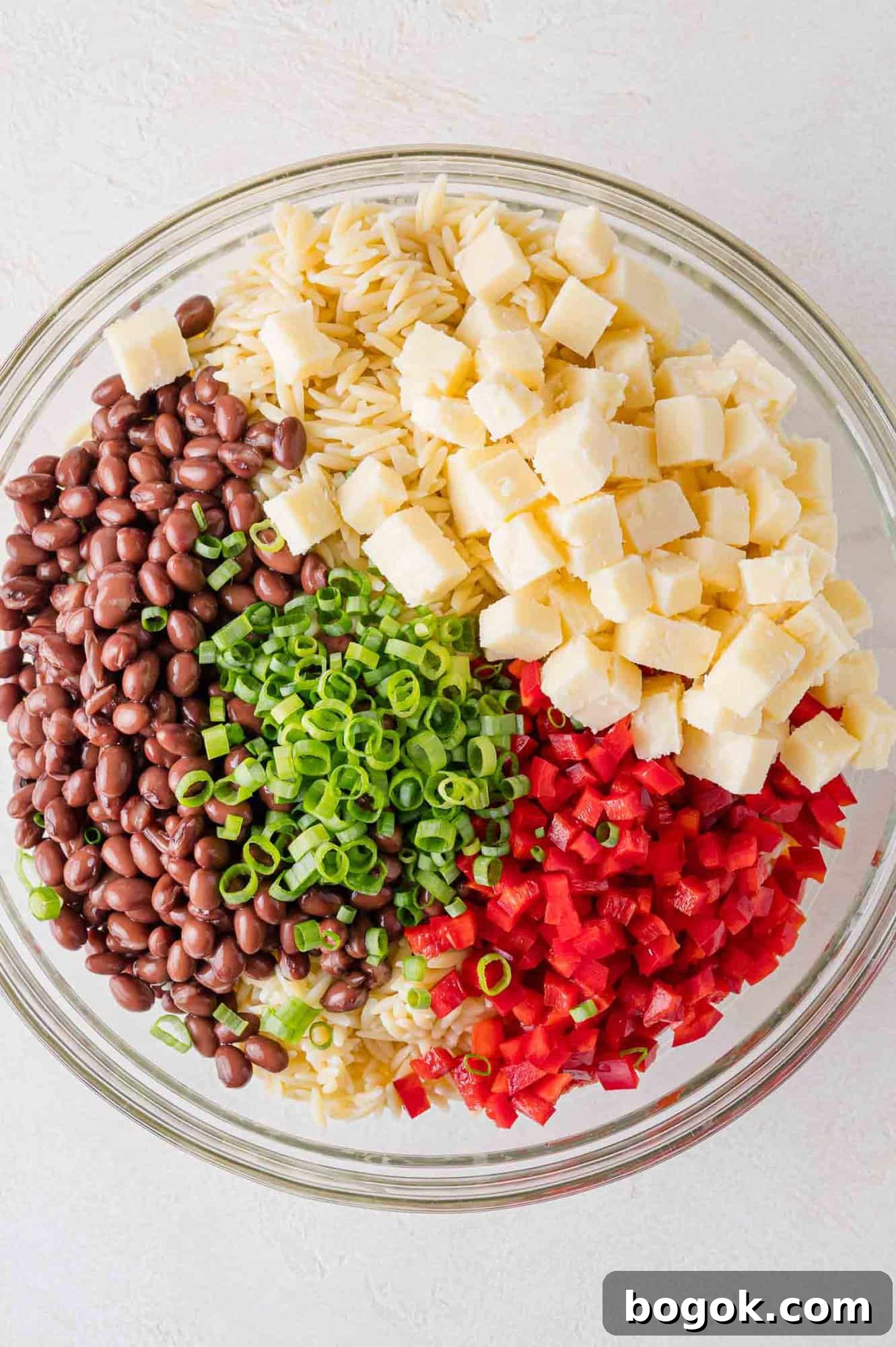 All ingredients except dressing in a large mixing bowl.