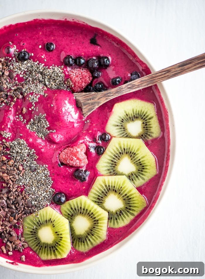 Strawberry and Beet Smoothie Bowl with Creamy Almond Topping 2 Healthy Strawberry Beet Smoothie Bowl - Running on Real Food