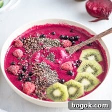 Strawberry and Beet Smoothie Bowl with Creamy Almond Topping 3 Strawberry Beet Smoothie with Almond Milk - Running on Real Food