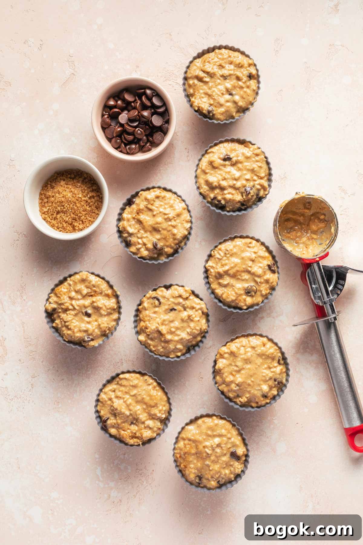 Overhead view of muffin batter in silicone muffin cups.
