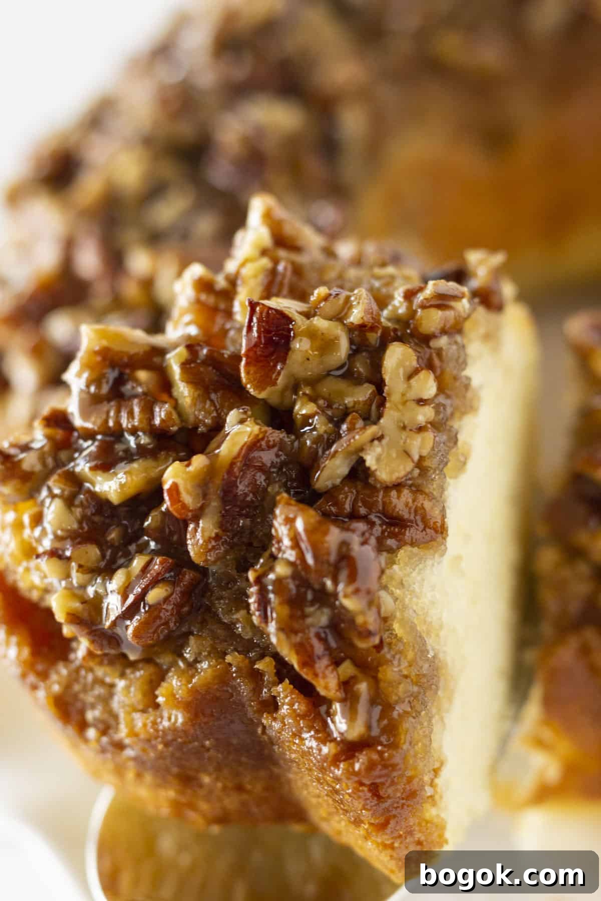 Serving a slice of Pecan Upside Down Cake.