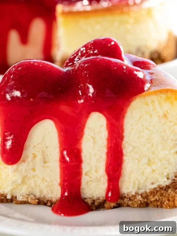 Strawberry sauce on top of cheesecake.