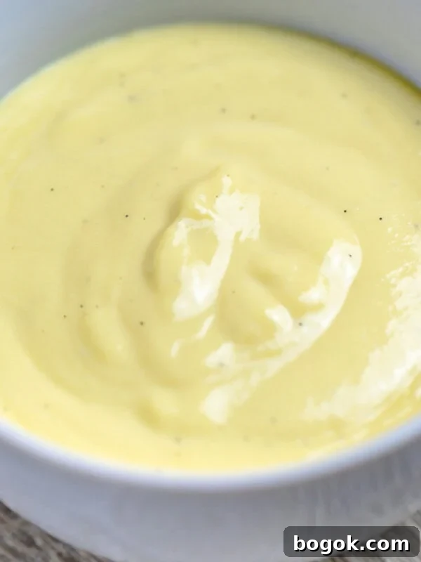 vanilla sauce bread pudding sauce in a bowl
