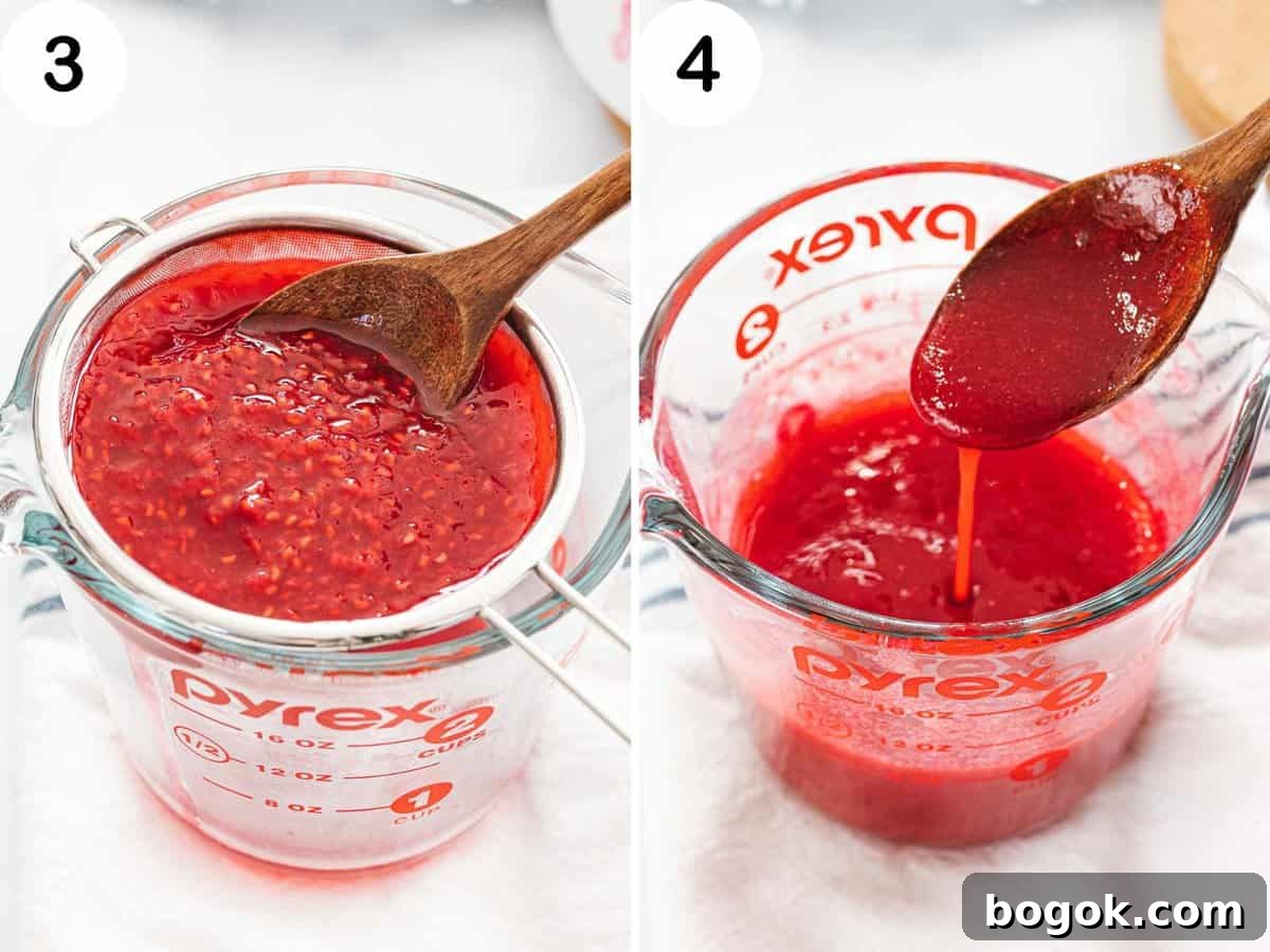 Raspberry sauce being strained to remove the seeds.