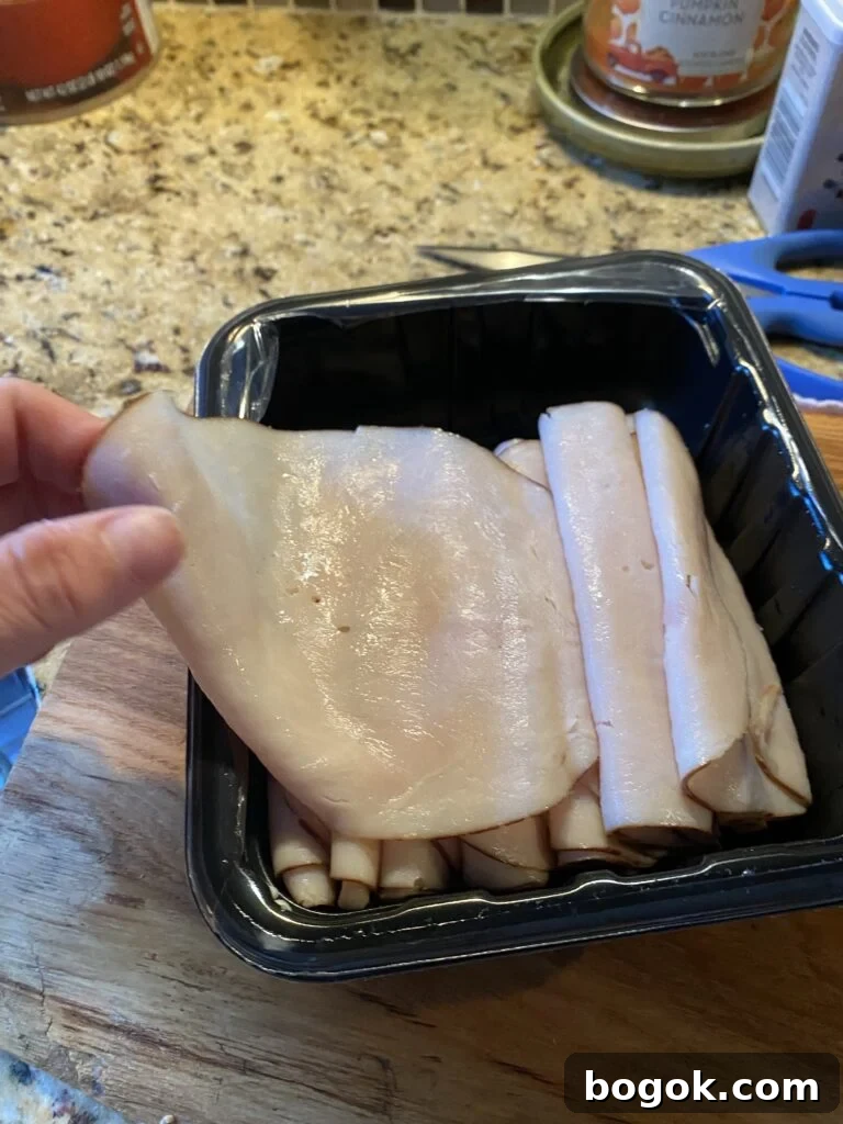 An open package of deli turkey