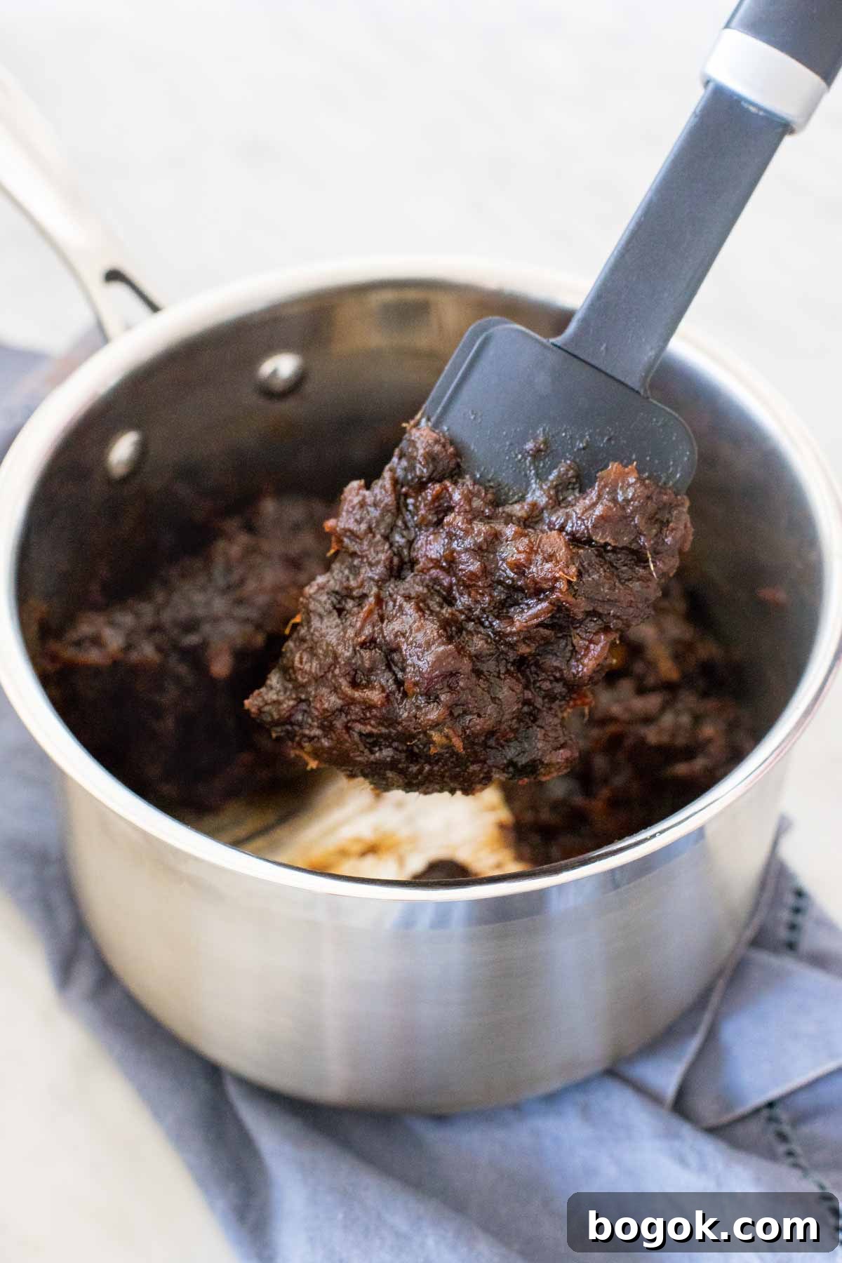 Boiled date mixture in a pan.