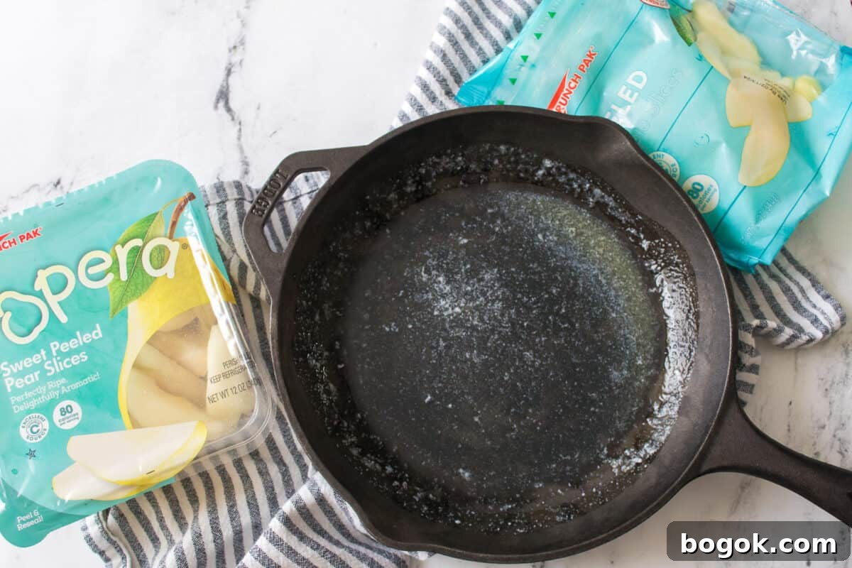 cast iron skillet with melted butter