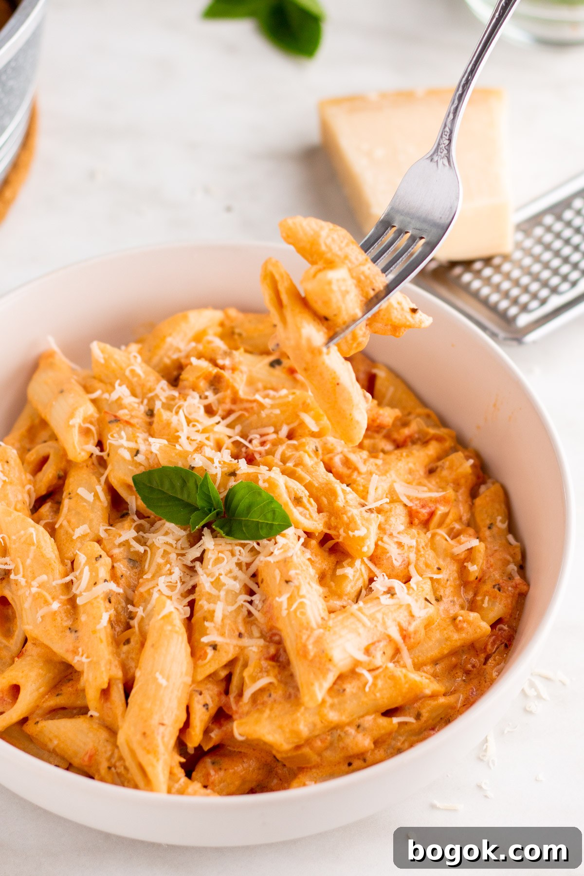served pink sauce pasta