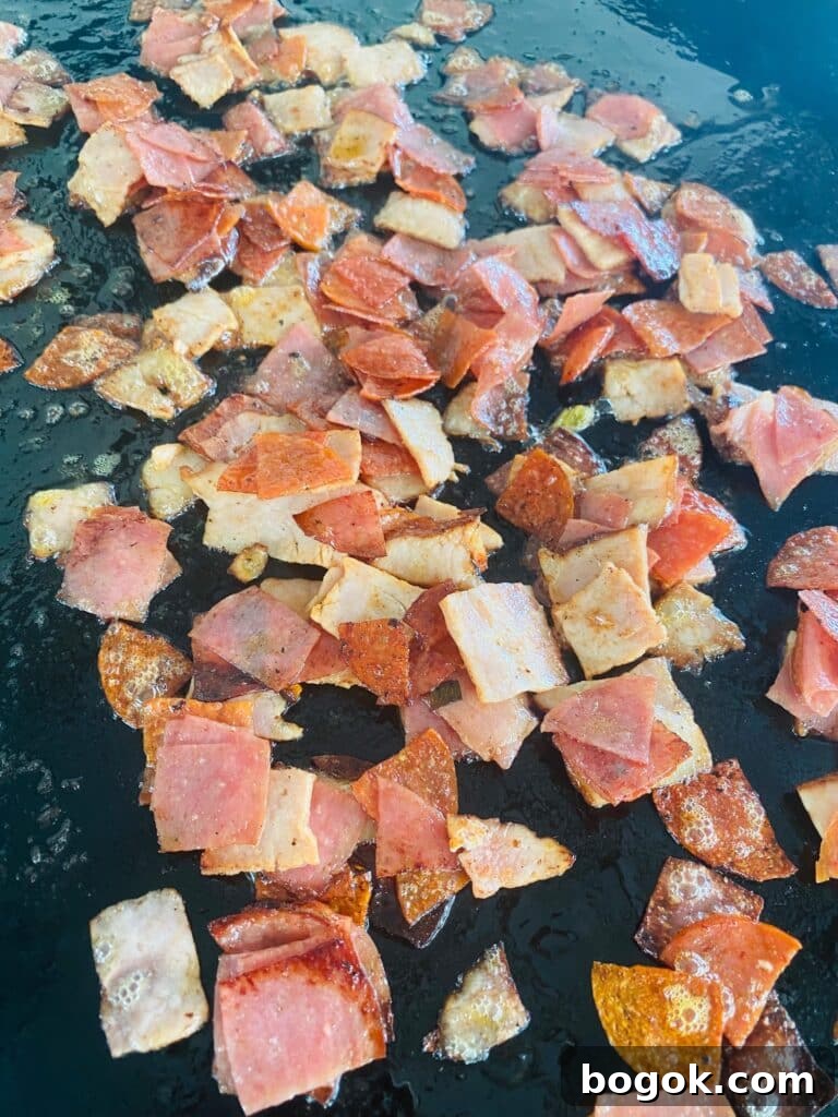 Blackstone Chopped Italian Sandwiches Recipe 5 chopped Italian meat on the griddle
