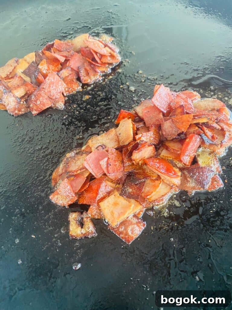 Blackstone Chopped Italian Sandwiches Recipe 6 meat in piles for the sub buns