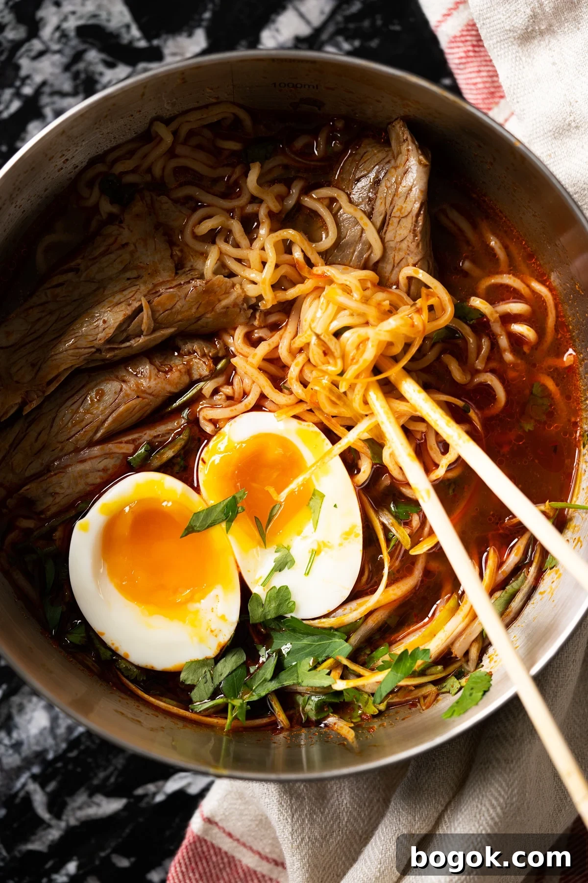 Paleo Keto Ramen with Shirataki Noodles: Low-Carb Comfort Bowl 2 Eating keto ramen with shirataki noodles, beef and a soft boiled egg