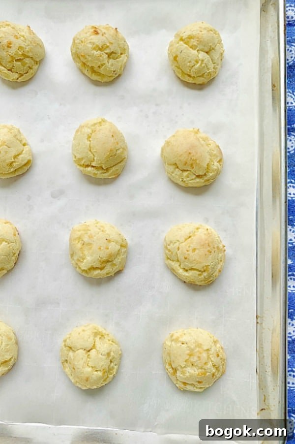 overhead view of baked gougeres - classic french cheese puffs