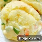 a cheese puff filled with homemade deviled egg salad