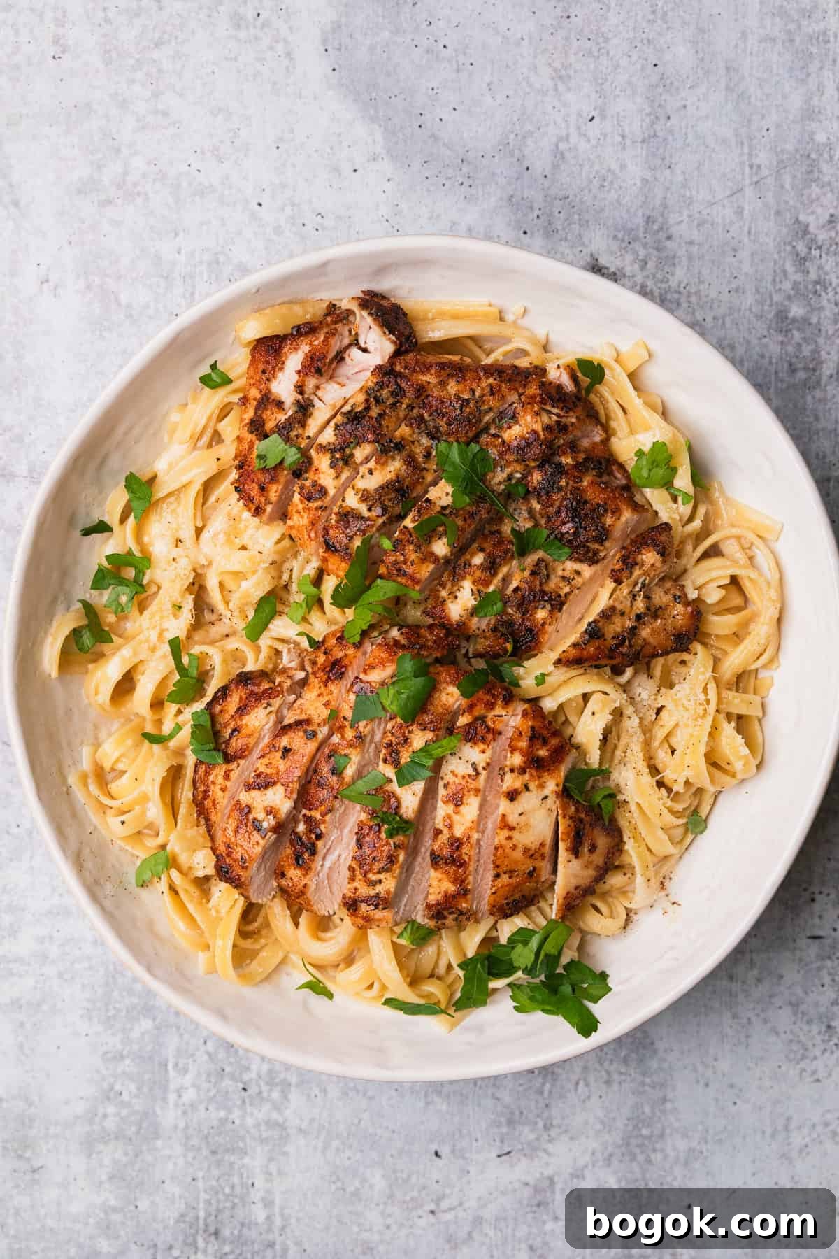 Lighter Chicken Fettuccine Alfredo Recipe (Olive Garden Style) 11 The completed chicken fettuccine alfredo recipe.