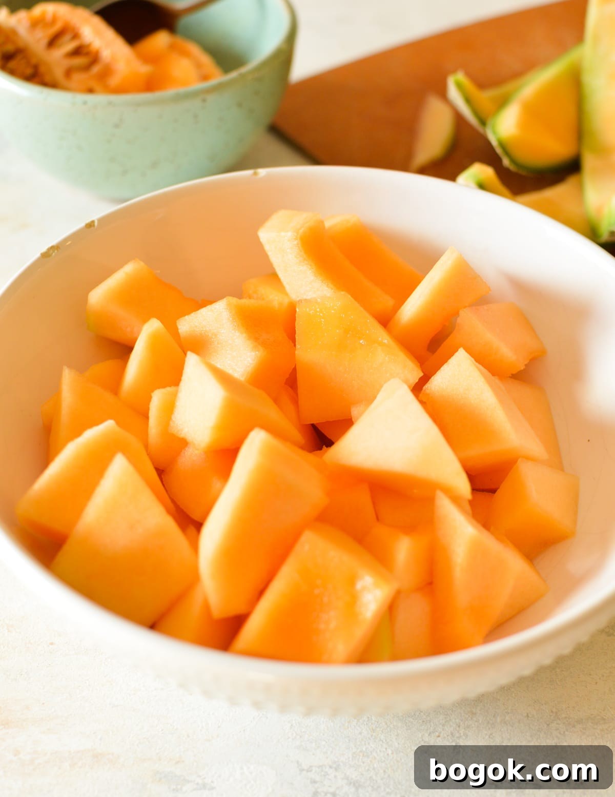 Refreshing Cantaloupe Juice Recipe: Cold, Natural & Delicious 10 a bowl of cantaloupe chunks.