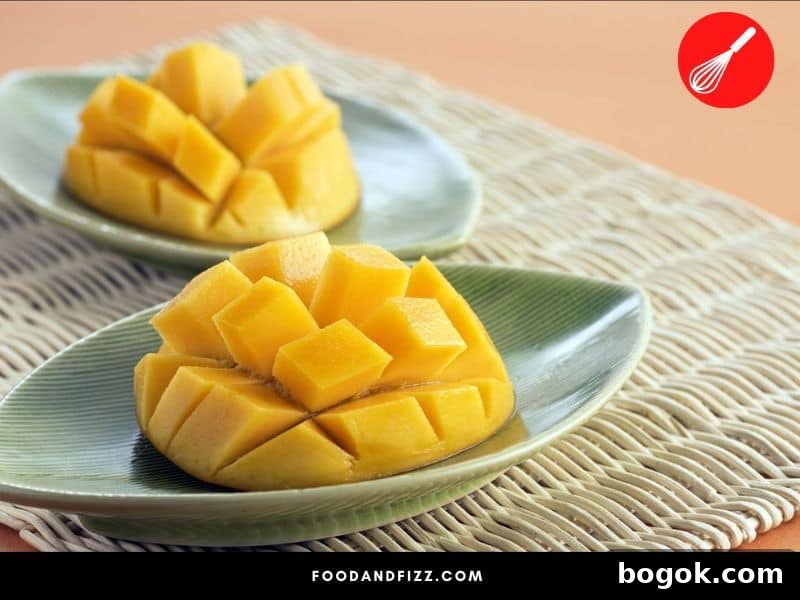 Black Spots on Mangoes: Causes and Is It Safe to Eat 5 Mangoes may easily be diced by making square cuts on each mango cheek without cutting through the skin.