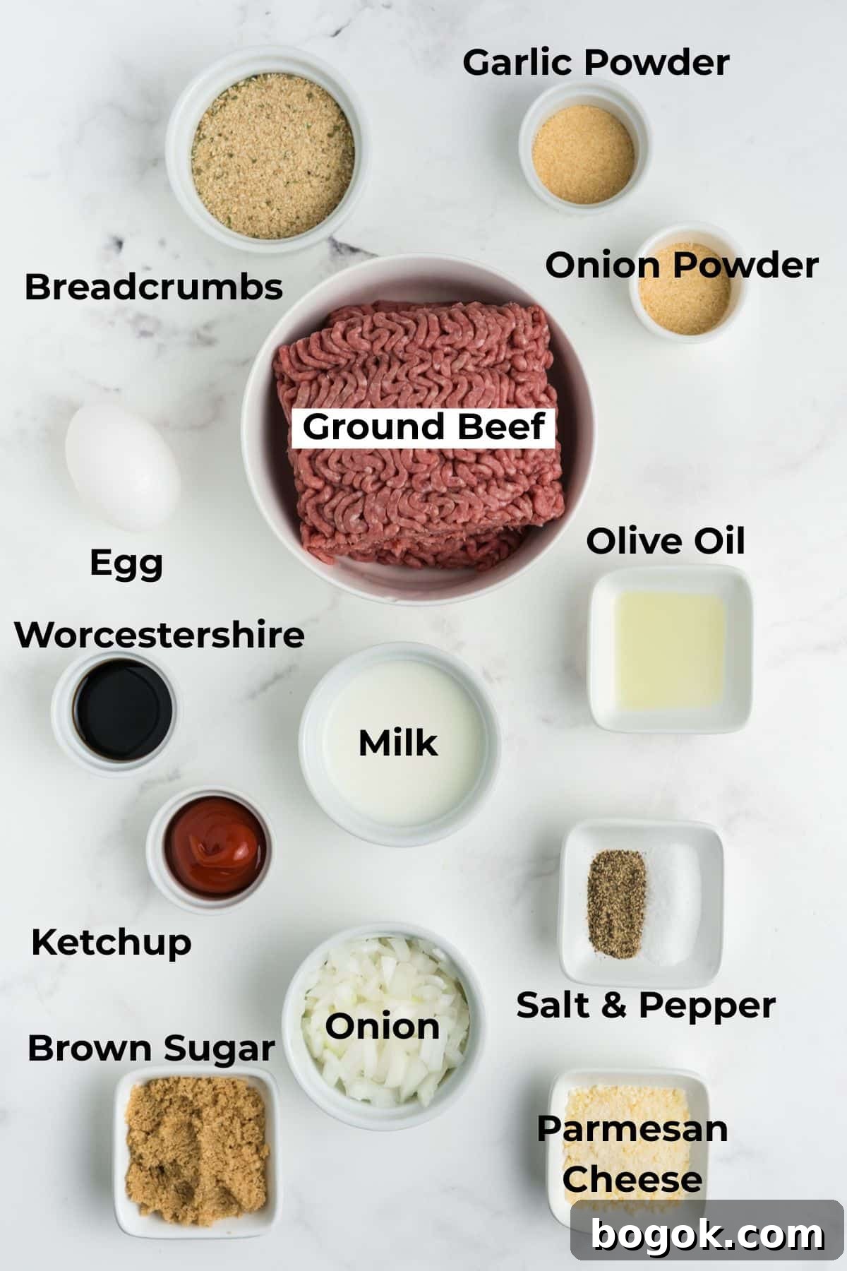 Ingredients to make this 1 pound meatloaf in bowls on a table.