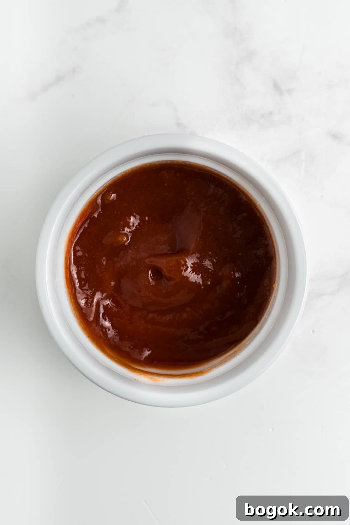 Ketchup, brown sugar, and Worcestershire sauce to a small bowl.