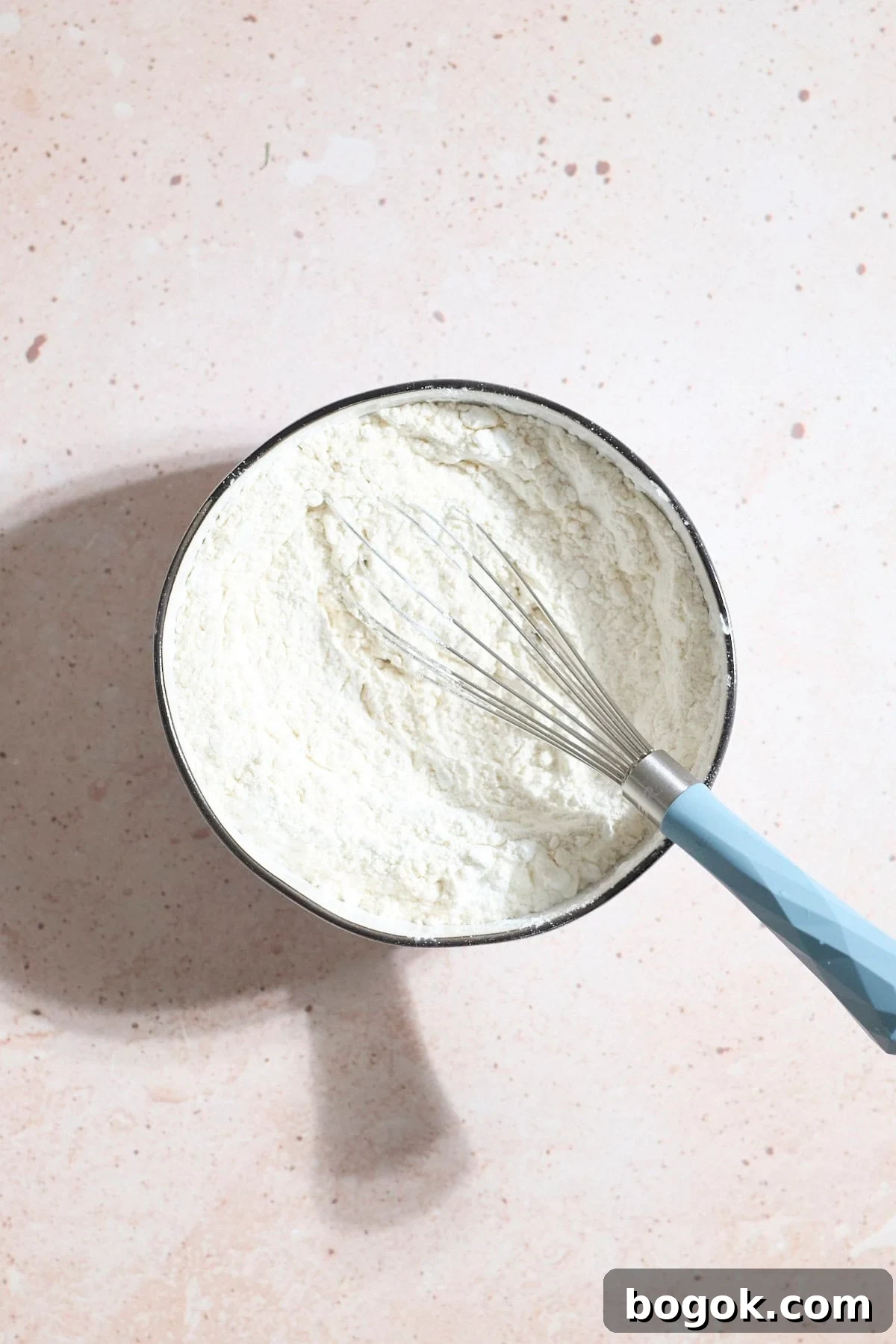 Dry ingredients in a small mixing bowl.