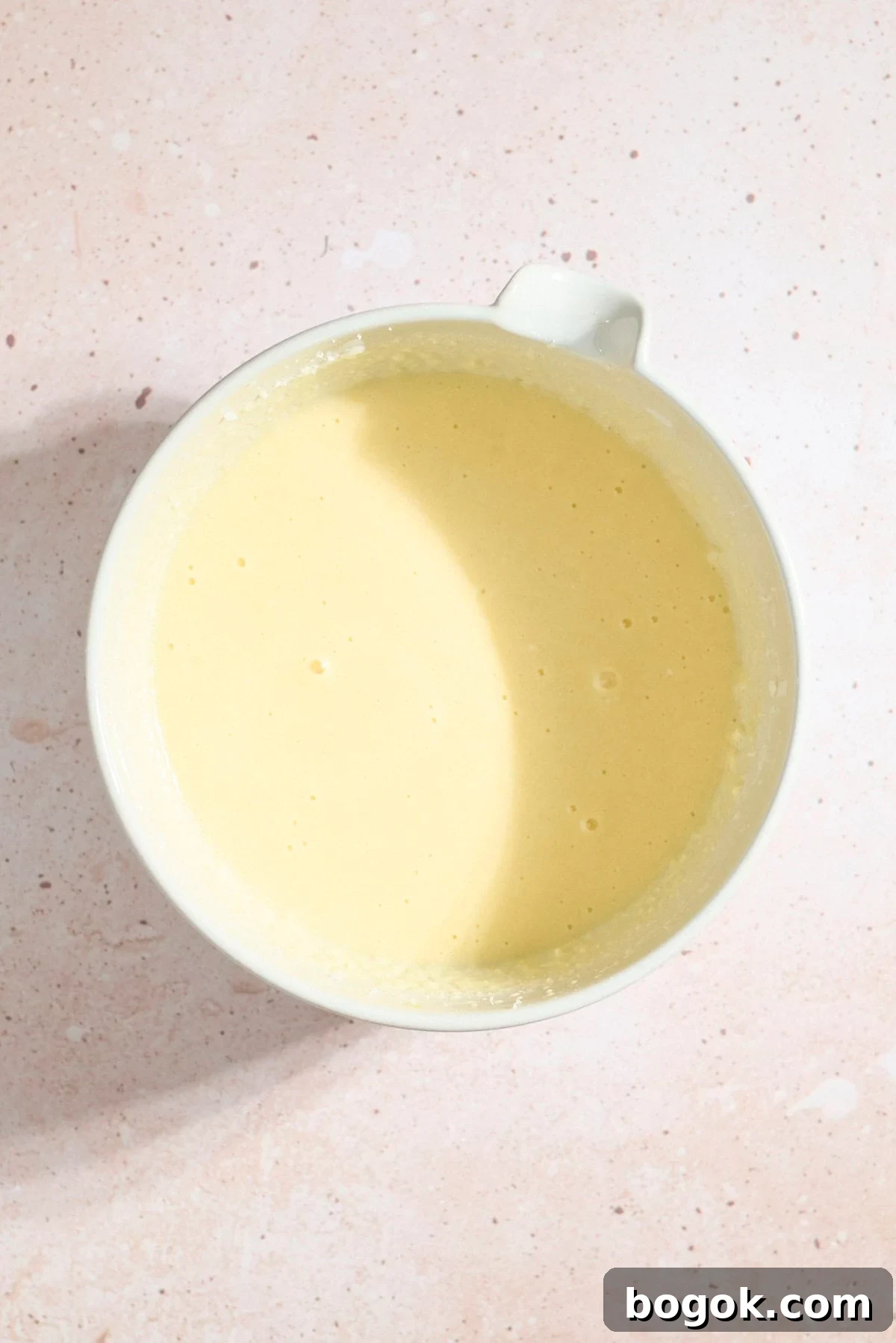 Wet ingredients in a large mixing bowl.