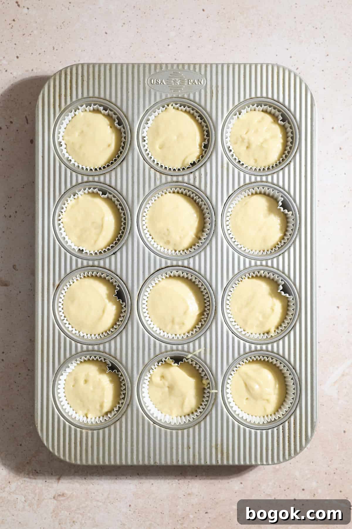 Cupcake batter in the cupcake liners.