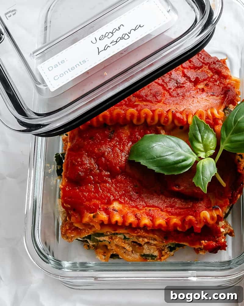 a piece of vegan lasagna in a storage container.