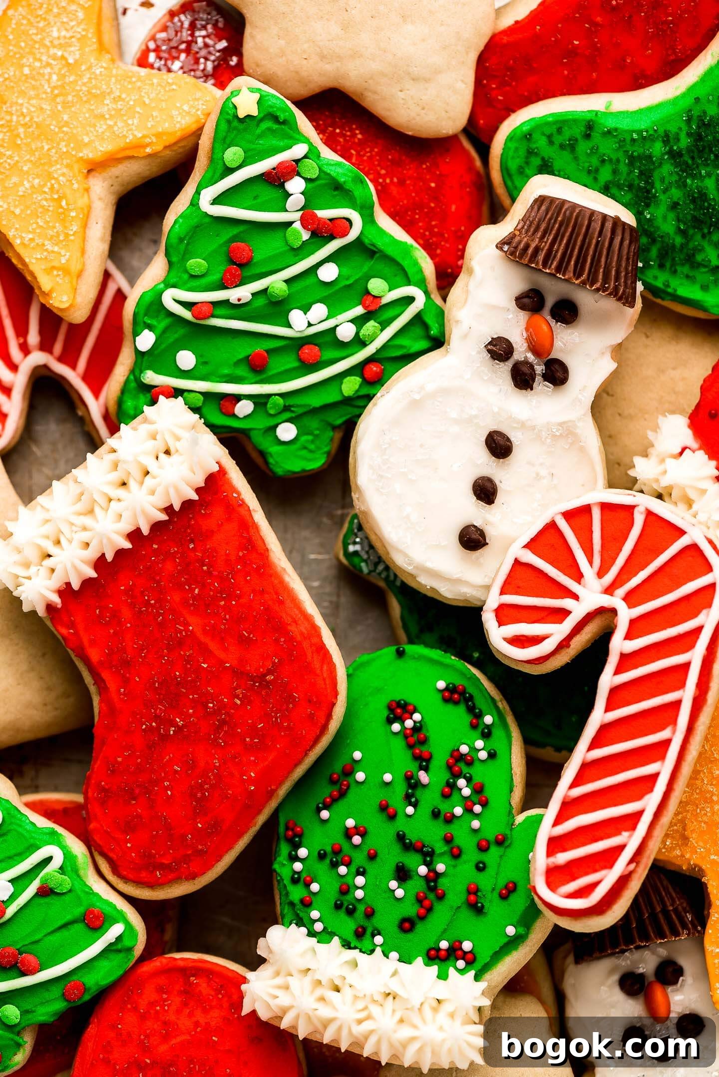 Christmas Sugar Cookie Recipes for Festive Decorating and Gifts 3 A close up of Christmas cut-out sugar cookies decorated with sprinkles and chocolate chips.