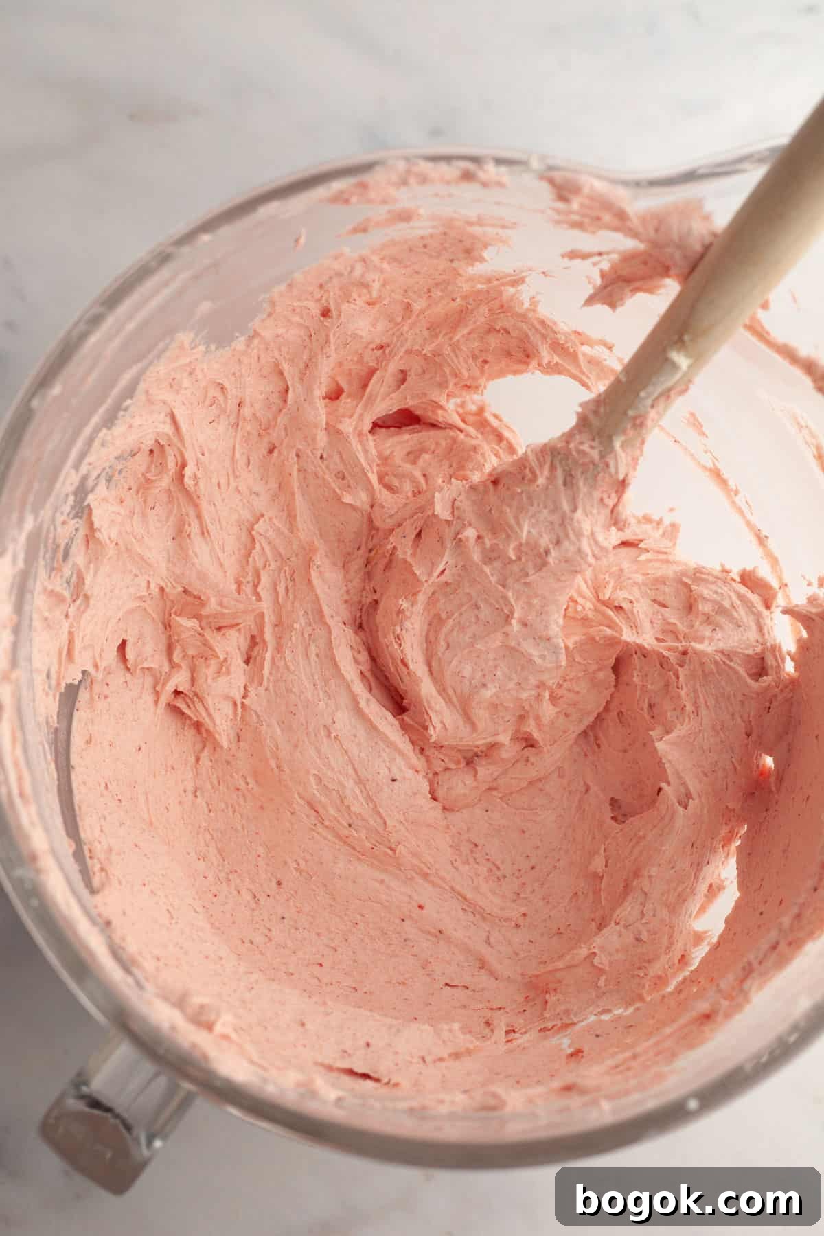 Strawberry buttercream in a large bowl.