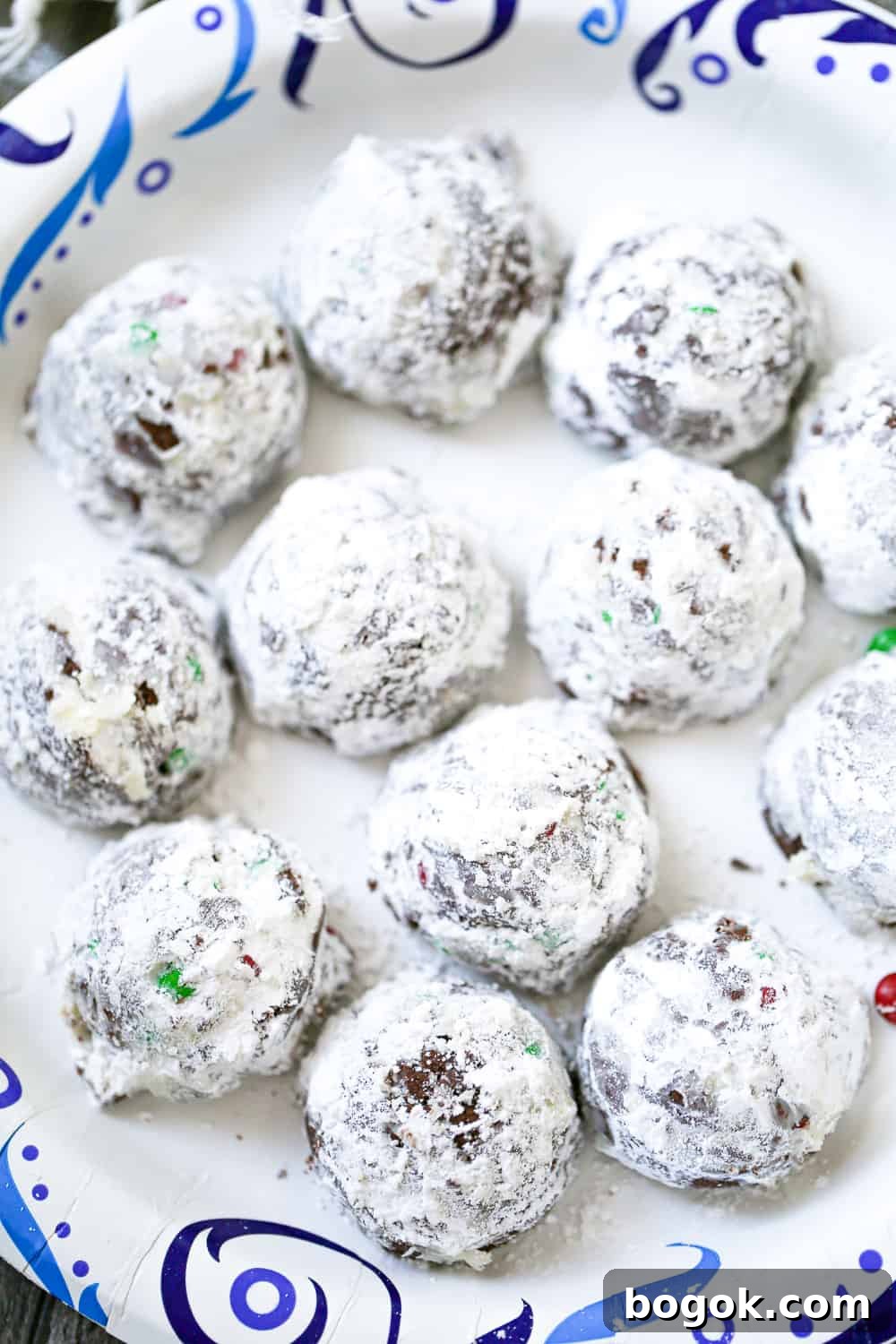Decadent Chocolate Snowball Cookies: Melt-in-Your-Mouth Recipe 4 best Chocolate Snowball Cookies recipe with festive m&ms and powdered sugar