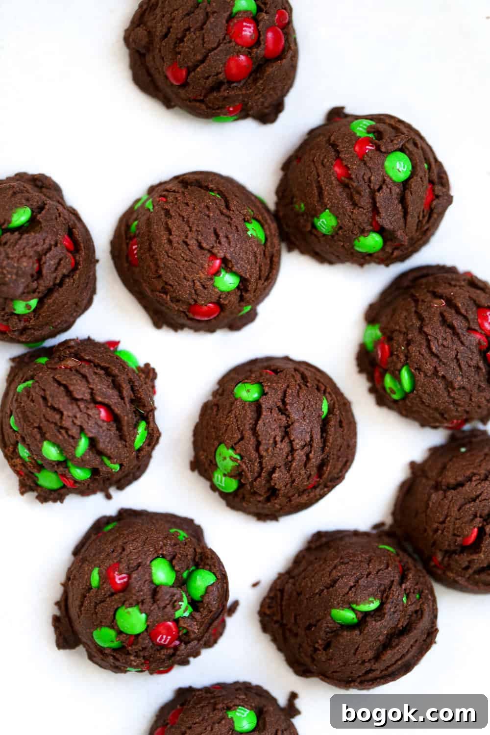 Decadent Chocolate Snowball Cookies: Melt-in-Your-Mouth Recipe 6 best Chocolate Snowball Cookies recipe with festive m&ms and powdered sugar